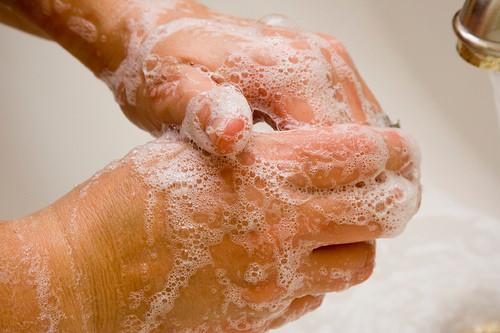 person washing hands