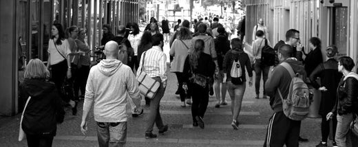 group of people walking on street